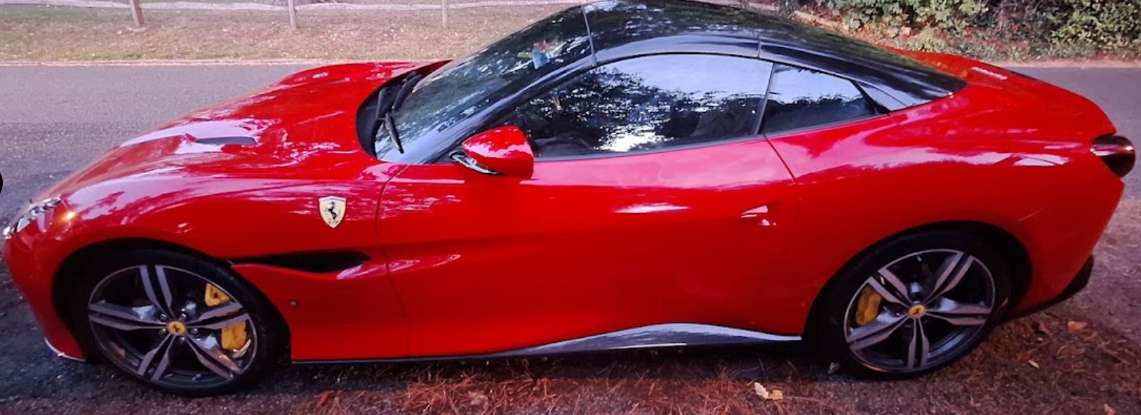 Red Ferrari freshly detailed by Cane Hill Car Detailing